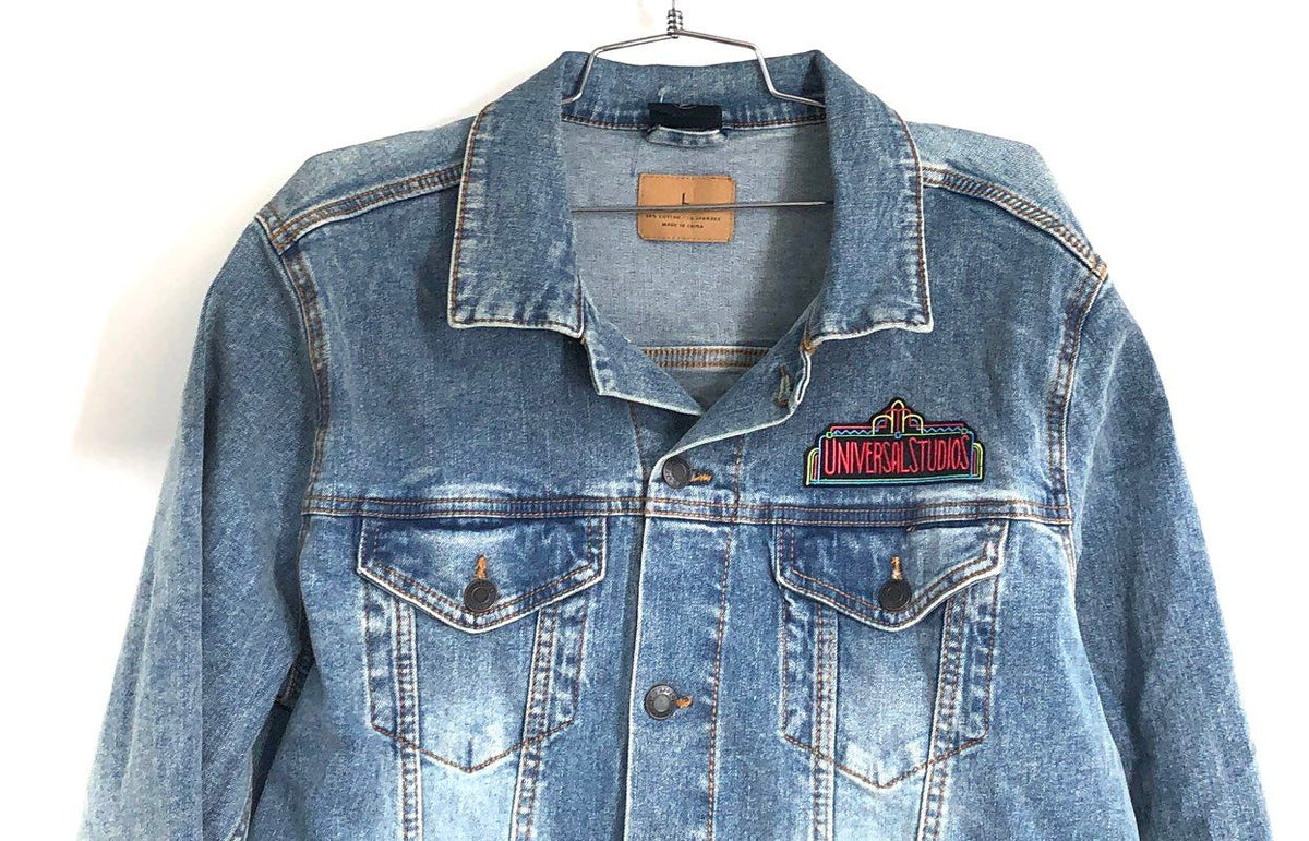Universal Studios Retro Neon Marquee Denim Trucker Jacket Sz L