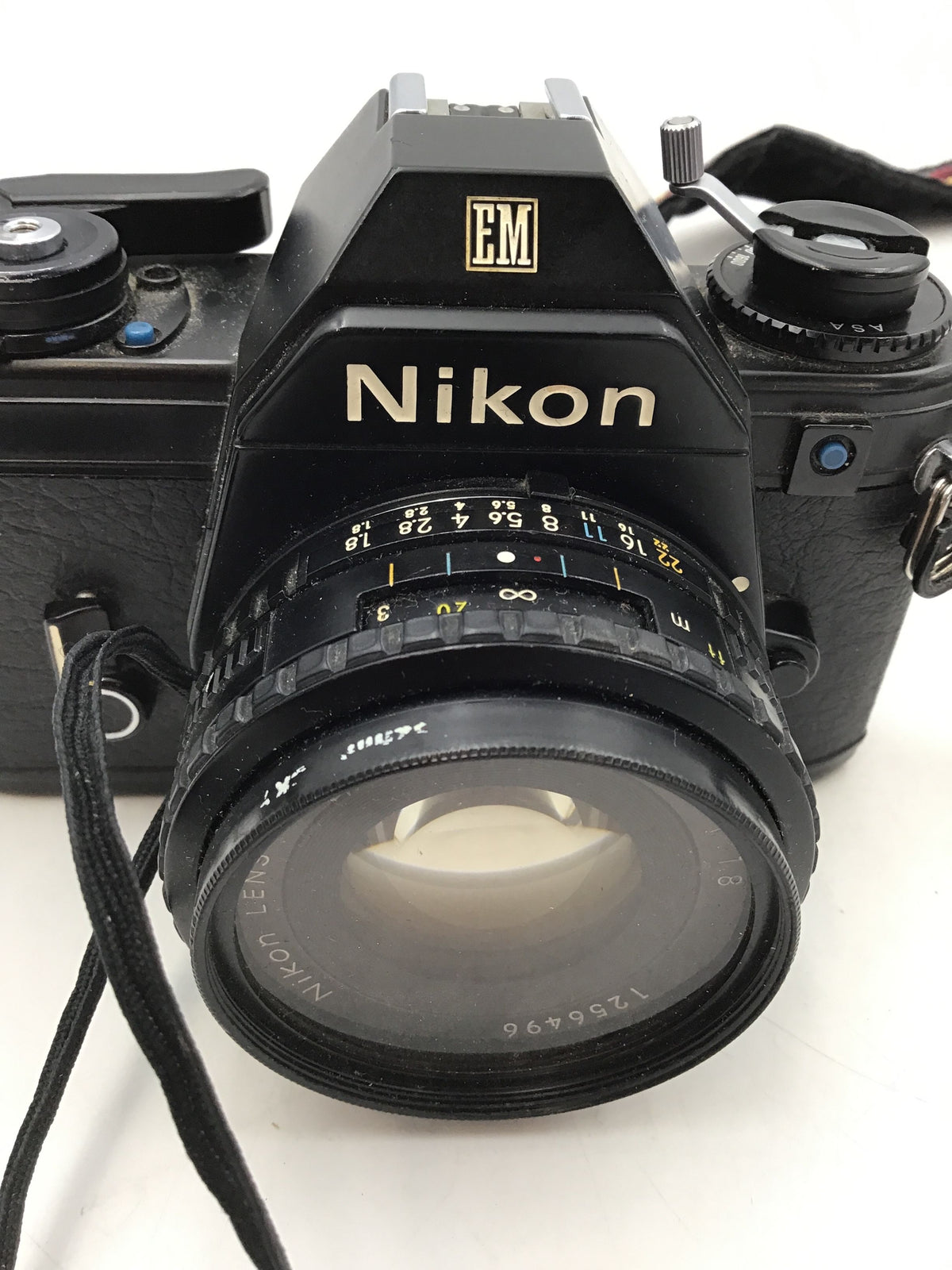 Nikon EM Black 35 mm Auto Exposure Manual Film SLR Camera With Neck Strap