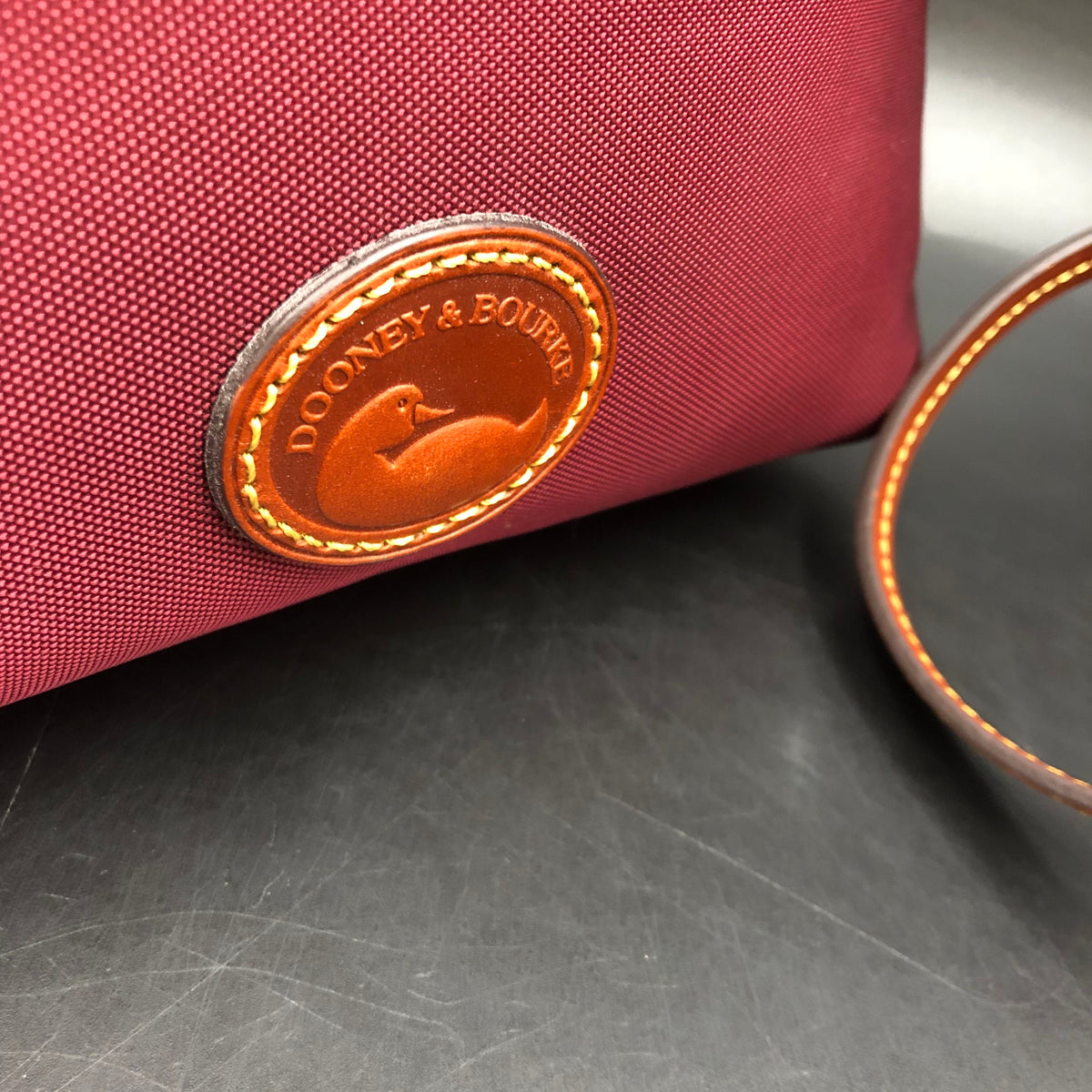 Dooney & Bourke Burgundy Nylon 'East\West' Crossbody Bag (+COA)