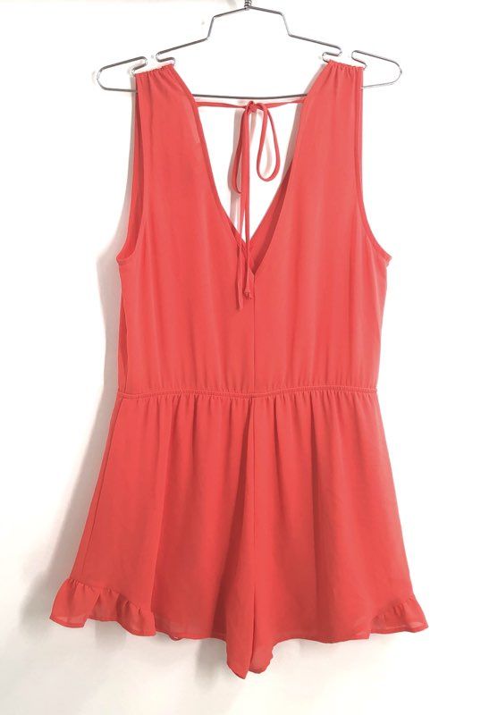 ASTR Women's Coral Surplice Sleeveless Ruffle Hem Tie Back Romper Sz S