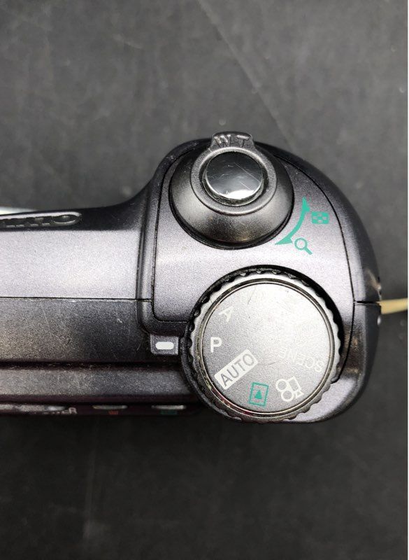 Olympus SP-320 Silver Manual Focus Point & Shoot Digital Camera