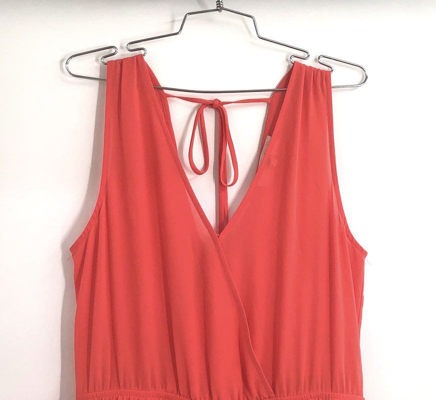 ASTR Women's Coral Surplice Sleeveless Ruffle Hem Tie Back Romper Sz S