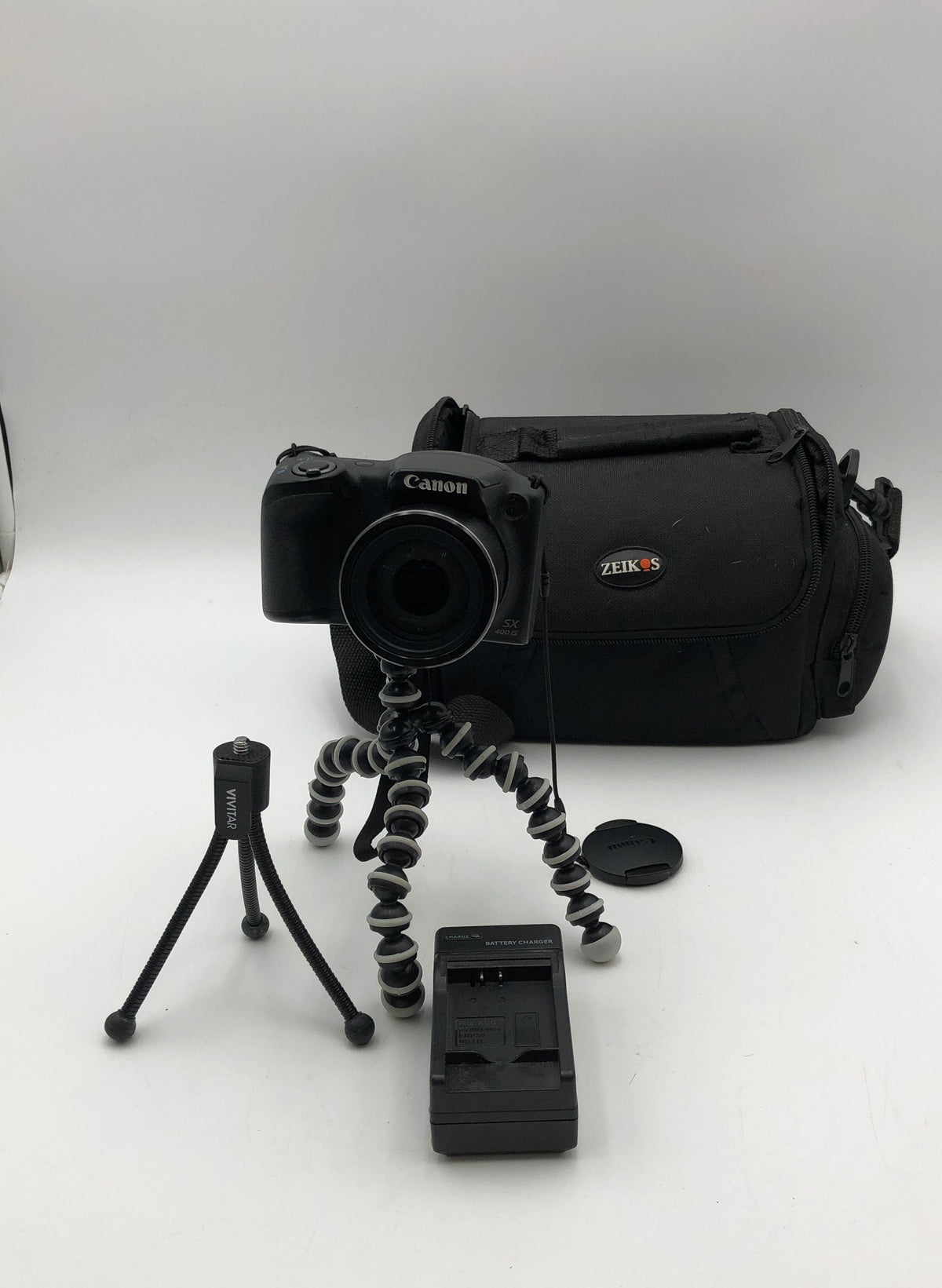 Canon PowerShot SX400 IS 16MP Digital Camera with Bag Tripod & Charger