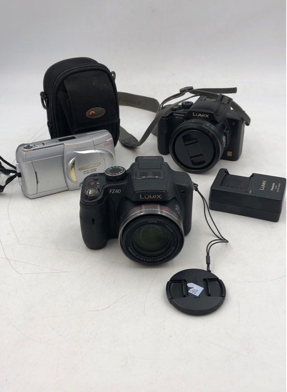 Olympus &amp; Panasonic Lumix DMC-FZ40 Digital Camera W/ Battery Charger Lot Of 3