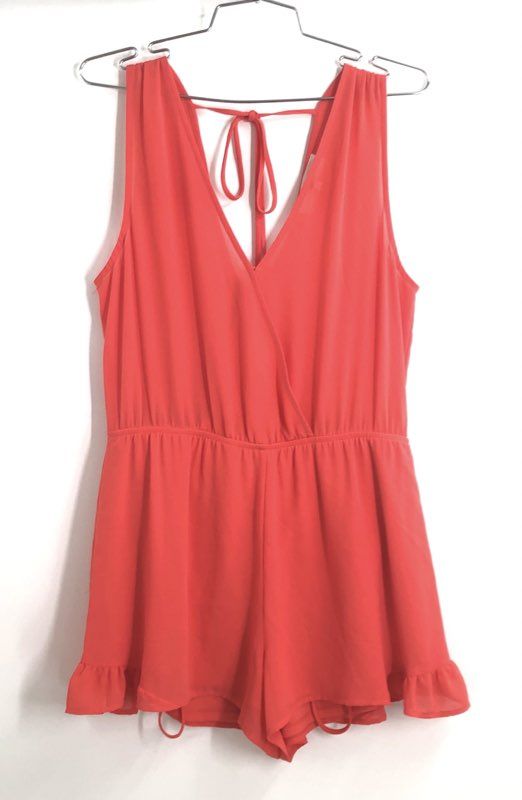 ASTR Women's Coral Surplice Sleeveless Ruffle Hem Tie Back Romper Sz S