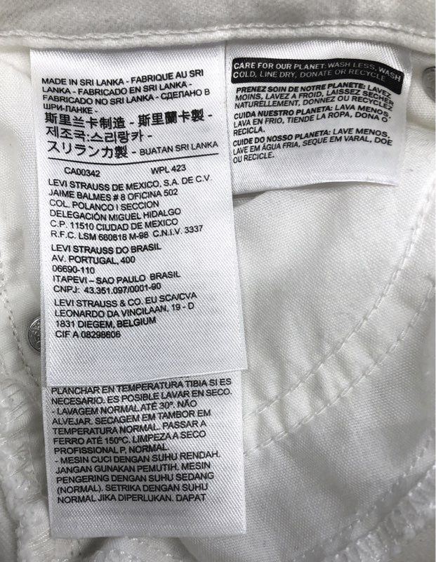 Levi's Women's 721 High Rise Skinny Jeans White Distressed Raw Hem Sz 27